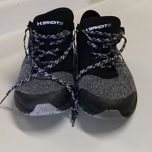 Under Armour size 11 mens bandit 2 sneakers.